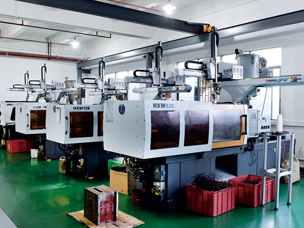 What aspects should be considered when selecting an injection molding robot?